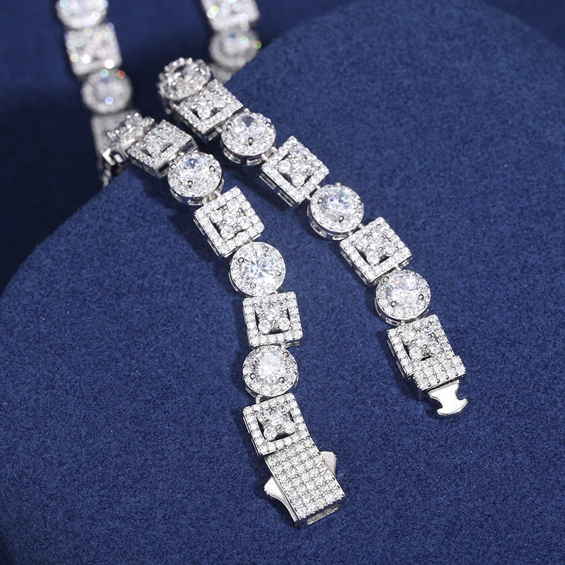 Iced Out Geometric Box Chain - VVS1 Moissanite x 925 Sterling Silver,Materials: 925 Sterling Silver Stone: VVS1 Moissanite (Passes) or Cubic Zirconia (Does Not Pass) Width: 8mm Introducing our Iced Out Geometric Box Chain, a stunning piece from The Diamon