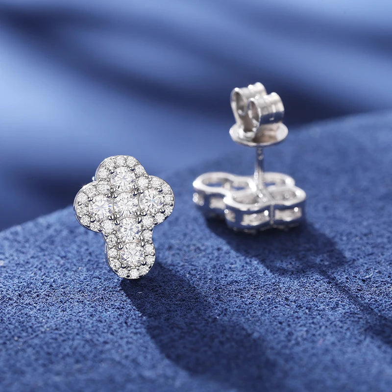 Iced Out Cross Studs made with 925 Sterling Silver and VVS1 Moissanite (24K Gold Plating),Material: 925 Sterling Silver Stone: VVS1 Moissanite (Passes) or Cubic Zirconia (Does Not Pass) Plating: 24K Gold Plating or Silver Experience the ultimate in elegan