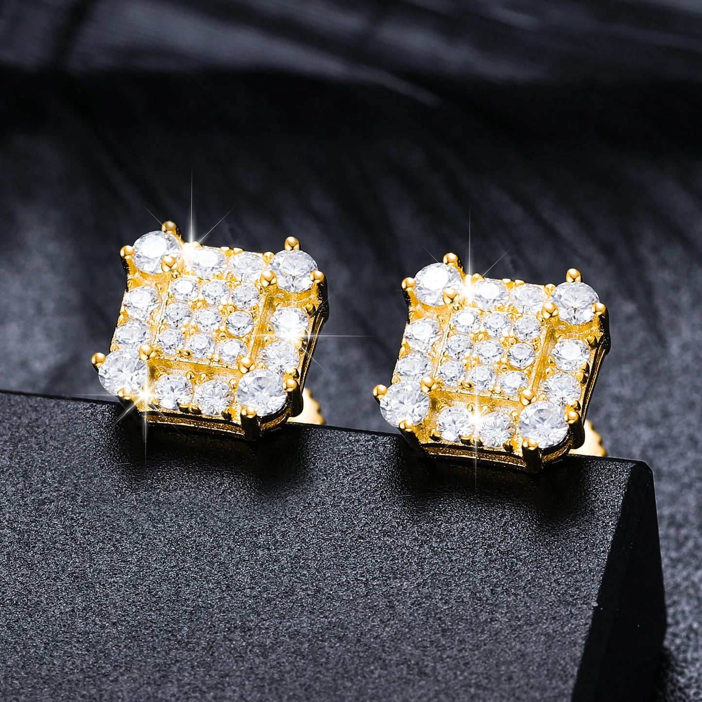 Iced Out Square Studded Studs made with 925 Sterling Silver and VVS1 Moissanite (24K Gold Plating),Material: 925 Sterling Silver Stone: VVS1 Moissanite Plating: 24K Gold Plating or Silver Add a touch of luxury to your jewelry collection with our Iced Out