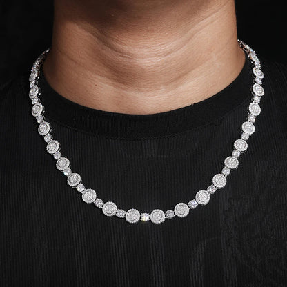 Iced Out Circular Beaded Chain 9mm - VVS1 Moissanite x 925 Sterling Silver,Material: 925 Sterling Silver Stone: VVS1 Moissanite Width: 9mm Elevate your jewelry collection with the Iced Out Circular Beaded Chain, a luxurious masterpiece crafted from the fi