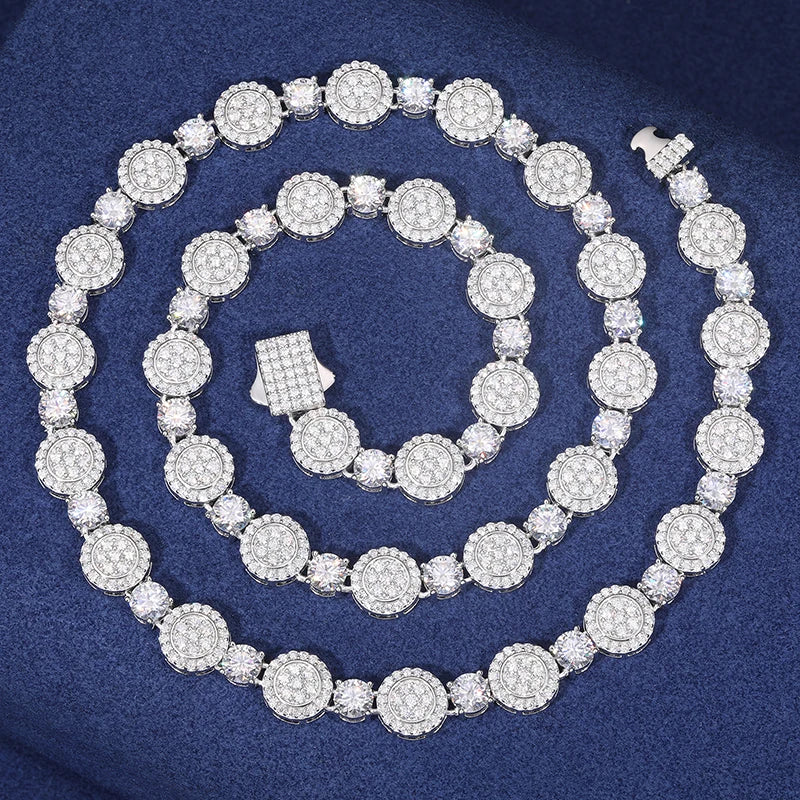 Iced Out Circular Beaded Chain 9mm - VVS1 Moissanite x 925 Sterling Silver,Material: 925 Sterling Silver Stone: VVS1 Moissanite Width: 9mm Elevate your jewelry collection with the Iced Out Circular Beaded Chain, a luxurious masterpiece crafted from the fi