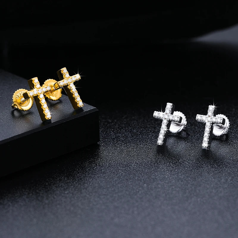 Iced Out Cross Studs made with 925 Sterling Silver and VVS1 Moissanite (24K Gold Plating),Material: 925 Sterling Silver Stone: VVS1 Moissanite Plating: 24K Gold Plating or Silver Discover the elegance and brilliance of our Iced Out Cross Studs. Expertly c